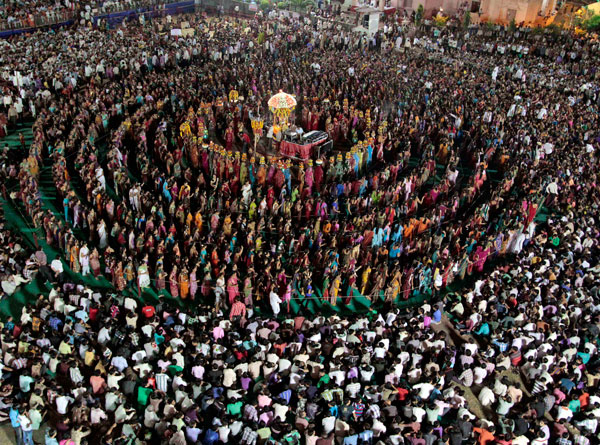 In this Tuesday, Oct. 4, 2011 photo, devotees perform the Garba, a traditional dance of the western Indian state of Gujarat, at the Umiya Mata temple on the eighth night of Navratri, or festival of nine nights, in Surat, about 270 kilometers (169 miles) south of Ahmadabad, India. (AP)