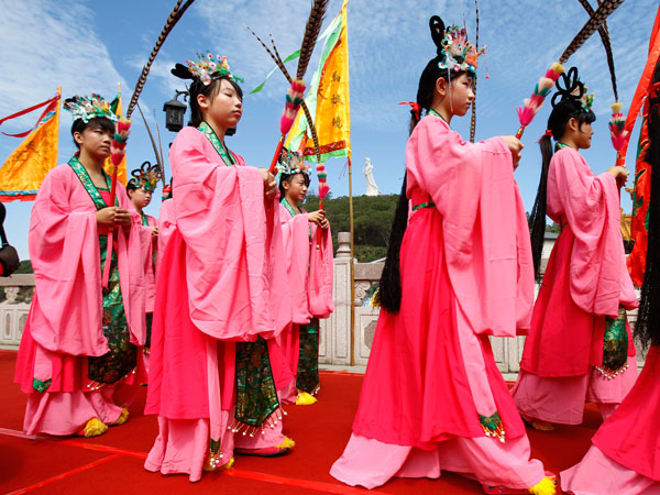 Dancers participate in a celebration of Matsu, the Chinese goddess of the sea on Nangan Island in Taiwan's outlying Matsu Island chain, Wednesday, Oct. 5, 2011. (AP)