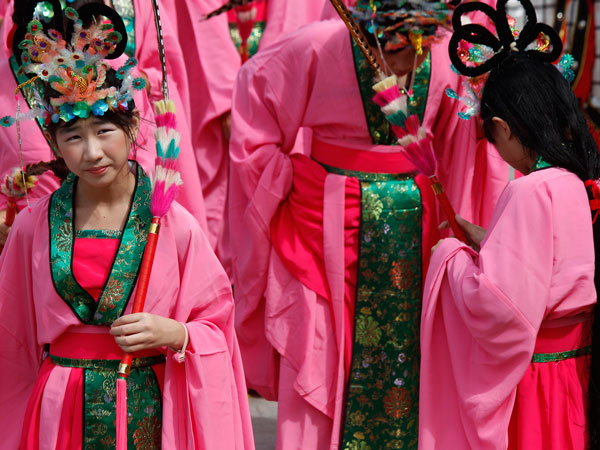 Dancers prepare for a celebration of Matsu, the Chinese goddess of the sea on Nangan Island in Taiwan's outlying Matsu Island chain, Wednesday, Oct. 5, 2011. (AP)