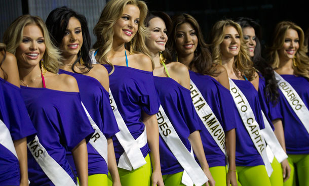 Miss Venezuela 2011 beauty pageant contestants pose for photographers during their practice session and media presentation in Caracas October 13, 2011. The pageant is scheduled to take place on October 15. (REUTERS)