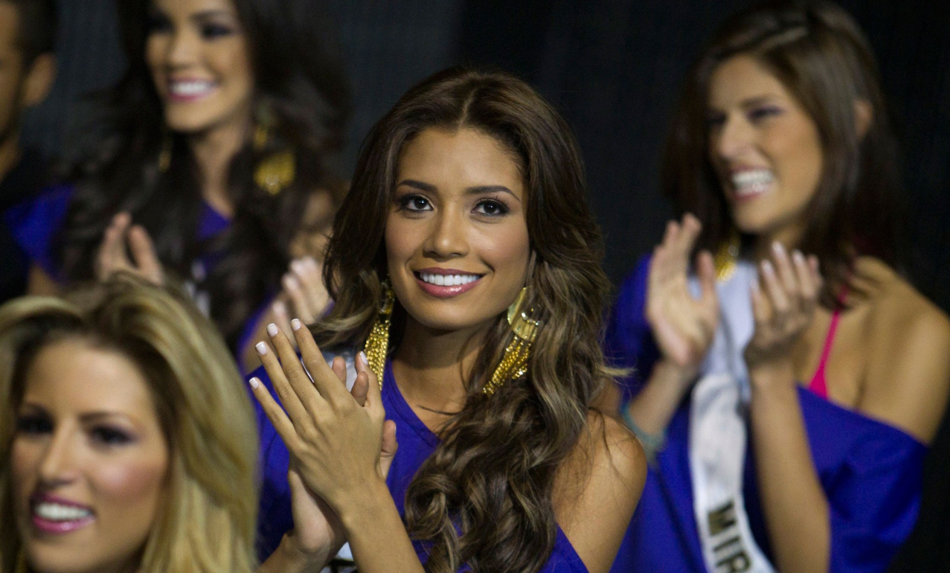 Miss Venezuela 2011 beauty pageant candidate Alexandra Hernandez (C) of Aragua, takes part in a practice session and media presentation in Caracas October 13, 2011. The pageant is scheduled to take place on October 15. (REUTERS)
