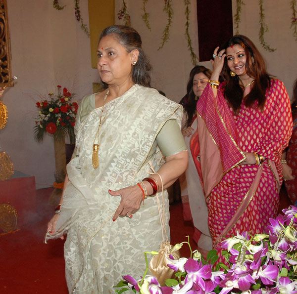 Aishwarya Rai Bachchan walking behind with mother-in-law Jaya Bachchan. (AP)