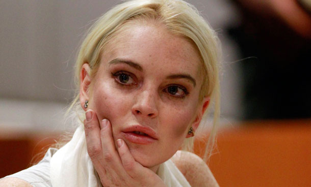 Lindsay Lohan is seen in court before being taken into custody by Los Angeles Country sheriffs deputies after a judge found her in violation of probation Wednesday, Oct 19, 2011, in Los Angeles. (AP)