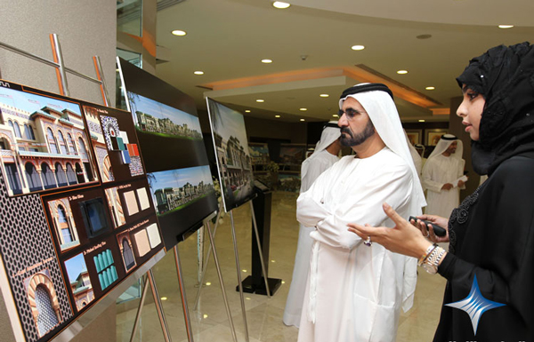 Mohammed listens to briefing on architectural aspects of one project. (SUPPLIED)