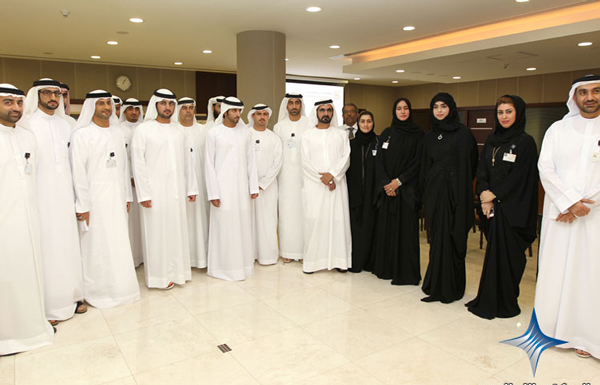 Mohammed bin Rashid in a group photo with Wasl staff. (SUPPLIED)
