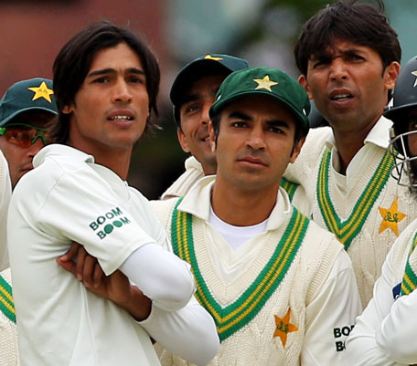 Mohammad Amer, Salman Butt and Mohammad Asif of Pakistan watch the big screen replay during the fourth Test against England at Lord's on August 27, 2010 in London, England. (FILE)