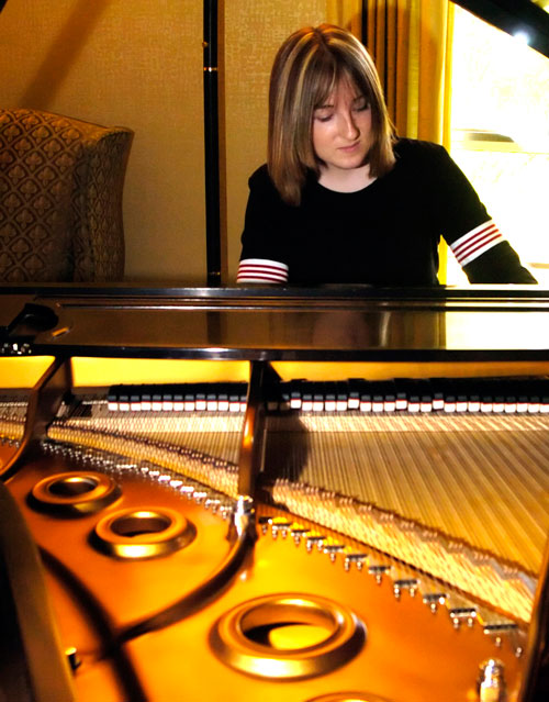 In this March 17, 2005, photo Hillary Adams, the daughter of Aransas County Court-at-Law Judge William Adams, practices the piano at her home in Rockport, Texas. Williams Adams told a Corpus Christi television station the video secretly recorded in 2004 looks &ldquo;worse than it is.&rdquo; The video shows Adams violently whipping his daughter, Hillary, in the legs more than a dozen times, while she screams and refuses to turn over on a bed to be beaten (AP)