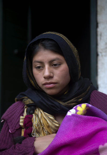 Mexican Tzotzil native who converted to Islam, sit in their house in San Cristobal de Las Casas, Chiapas state on October 18, 2011 (AFP)