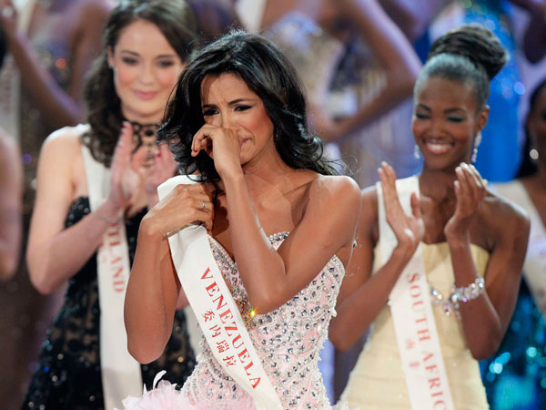Miss Venezuela Ivian Sarcos reacts as she is announced winner at the Miss World competition held at Earls Court in London, Sunday, Nov. 6, 2011. (AP)