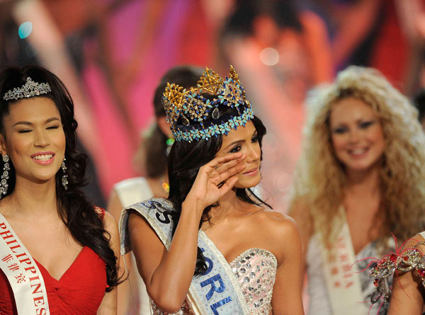 Miss Venezuela, Ivian Sarcos, reacts after being crowned Miss World 2011 in Earls Court in west London November 6, 2011. (REUTERS)