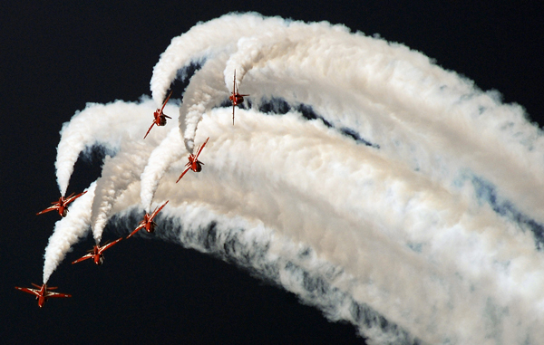 In this Thursday, Nov. 15, 2007 file photo, the Royal Air Force's Red Arrows display team perform a flying display during the 5th and final day at the 10th Dubai Air show in Dubai, United Arab Emirates. (AP)
