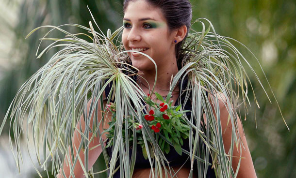 A model presents a creation by Colombian designer Ann Murcia during the Biofashion Habitat show in Cali November 26, 2011. The designs are made with live plants and natural materials. (REUTERS)