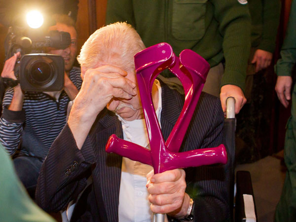Defendant Adolf B. arrives at court in Nuremberg, southern Germany, on November 28, 2011. The German pensioner accused of raping his daughter repeatedly over a 34-year-period and fathering three children with her went on trial. (AFP)