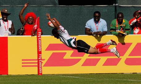 UAE's Emad Reyal scores the first try for UAE at the Emirates Airline Dubai Rugby Sevens tournament at The Sevens stadium in Dubai on Friday. (SUPPLIED)