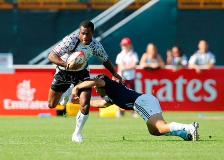 Action from the pool A match between Fiji and UAE at the Emirates Airline Dubai Sevens Rugby Tournament at The Sevens stadium in Dubai on Friday. (SUPPLIED)