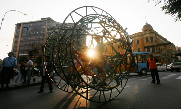 French street theatre company, Generik Vapeur perform "Lima Rueda", an artistic parade at downtown Lima, December 4, 2011. The parade seek to promote the use of bicycles in the city. (REUTERS)