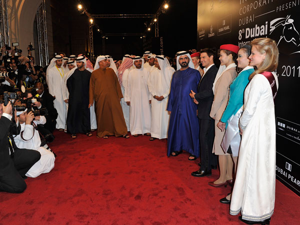 His Highness Sheikh Mohammed bin Rashid Al Maktoum, Vice-President and Prime Minister of the UAE and Ruler of Dubai (fifth right) and actor Tom Cruise (fouth right) and guests attend the "Mission: Impossible - Ghost Protocol" Premiere during day one of the 8th Annual Dubai International Film Festival held at the Madinat Jumeriah Complex on December 7, 2011 in Dubai, United Arab Emirates. (GETTY)