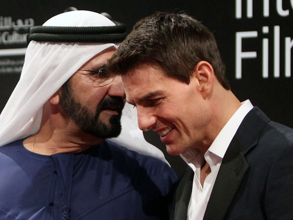 His Highness Sheikh Mohammed bin Rashid Al Maktoum, Vice-President and Prime Minister of the UAE and Ruler of Dubai talking to US actor Tom Cruise (R) at the Dubai International Film Festival (DIFF) in the Gulf emirate on December 7, 2011 where the film "Mission: Impossible - Ghost Protocol" was premiered.  (AFP)