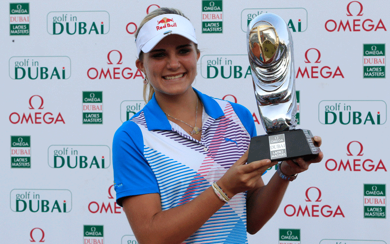 Alexis Thompson of the U.S. poses with her trophy after winning the Dubai Ladies Masters European Tour at the Emirates golf club in Dubai. (REUTERS)