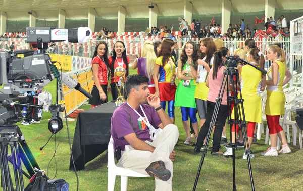 Cheerleaders ready to take center stage during the opening ceremony of Celebrity Cricket League at the Sharjah Cricket Stadium, January 13, 2012 (KAMRAN)