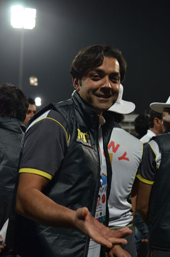 Bobby Deol interacting with Emirates 24|7 photo journalist during the opening ceremony of Celebrity Cricket League at the Sharjah Cricket Stadium, January 13, 2012. (KAMRAN)