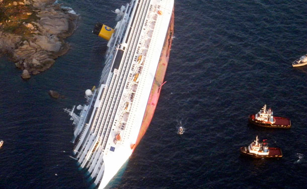 Costa Concordia cruise ship that ran aground is seen off the west coast of Italy at Giglio island January 14, 2012. At least three people were killed and rescuers were searching for other victims after an Italian cruise ship carrying more than 4,000 people ran aground and keeled over in shallow waters. (REUTERS)