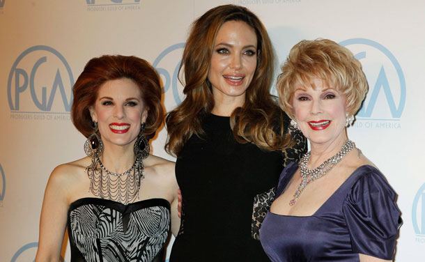 Actress Angelina Jolie (C) poses with Karen Sharpe-Kramer, widow of director Stanley Kramer, and Kramer's daughter Kat Kramer (L) at the 23rd annual Producers Guild Awards in Beverly Hills, California, January 21, 2012. Jolie, who directed and produced the film "In The Land of Blood and Honey", and other producers of the film received The Stanley Kramer Award at the event. (REUTERS)