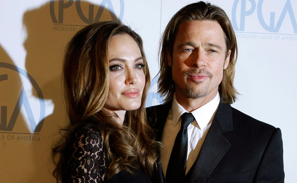 Actress Angelina Jolie and her partner Brad Pitt arrive at the 23rd annual Producers Guild Awards in Beverly Hills, California, January 21, 2012. Jolie, who directed and produced the film "In The Land of Blood and Honey", and other producers of the film received the Stanley Kramer Award at the event.(Reuters)