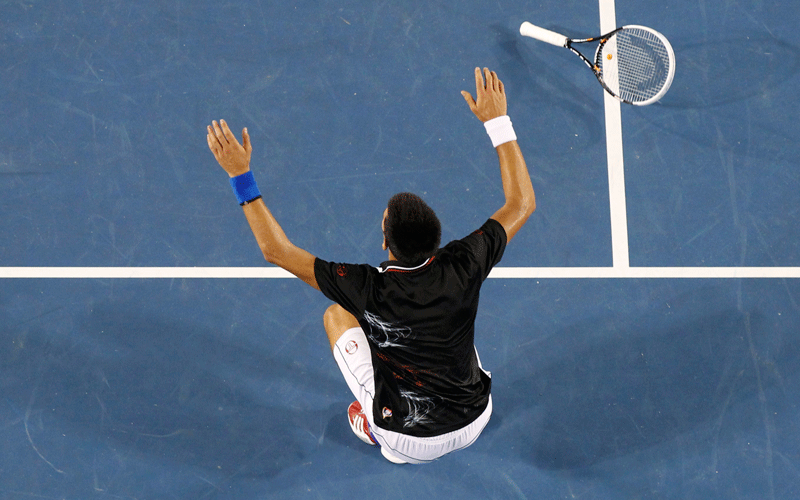 Novak Djokovic of Serbia celebrates after defeating Rafael Nadal of Spain in their men's singles final match at the Australian Open tennis tournament in Melbourne. (REUTERS)