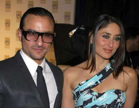 Bollywood actors Saif Ali Khan (L) and Kareena Kapoor pose for a photgraph. (REUTERS)