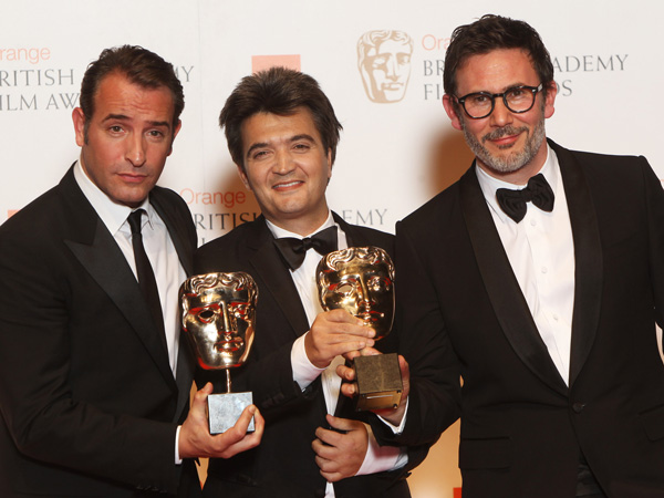 L-R Jean Dujardin, Thomas Langmann and Michel Hazanavicius pose with their awards for The Artist in the press room at The Orange British Academy Film Awards 2012 at The Royal Opera House on February 12, 2012 in London, England. (GETTY)
