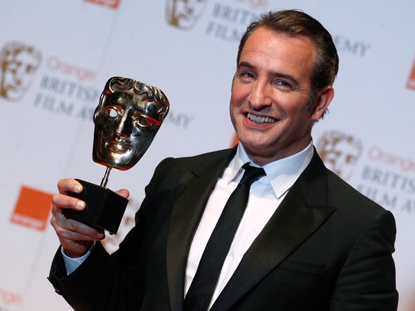 Jean Dujardin celebrates after winning the Best Actor award for "The Artist" at the British Academy of Film and Arts (BAFTA) awards ceremony at the Royal Opera House in London February 12, 2012. (REUTERS)
