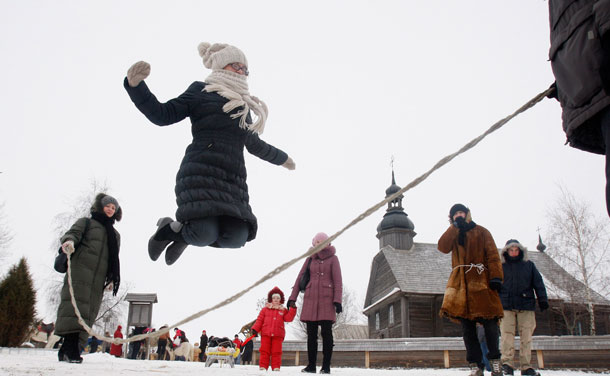 People celebrate Maslenitsa, or Pancake Week, in the village of Ozertso, outside Minsk, February 19, 2012. People celebrate Maslenitsa to mark the end of winter, which is a week of feasting before Lent.  (REUTERS)