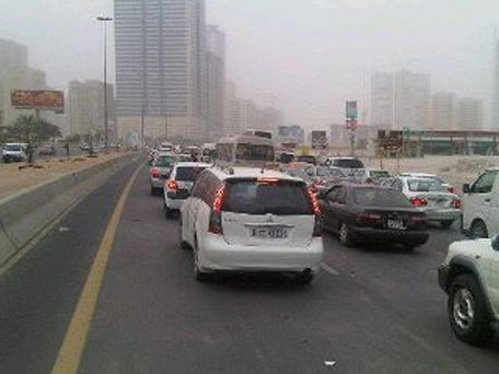 Sunday-morning traffic snarl. Sand storm doesn't help. (ASHOK VERMA)