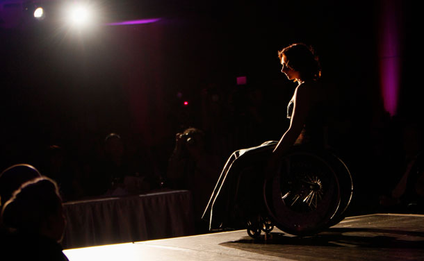 A competitor poses on stage during the Miss Colours Hungary, the country's first wheelchair beauty contest, in Budapest February 25, 2012. (REUTERS)