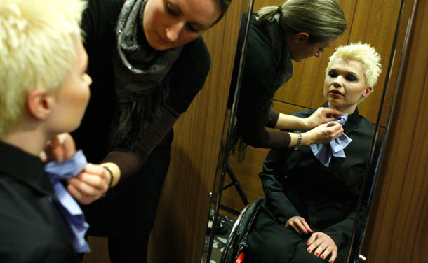 A competitor prepares before the Miss Colours Hungary, the country's first wheelchair beauty contest, in Budapest February 25, 2012. (REUTERS)