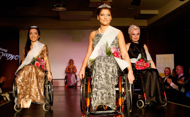 Second-placed Edina Melnyik (L), first-placed Katalin Eszter Varga (C) and third-placed Marietta Laura Molnar (R) pose after the Miss Colours Hungary, the country's first wheelchair beauty contest, in Budapest February 25, 2012. (REUTERS)