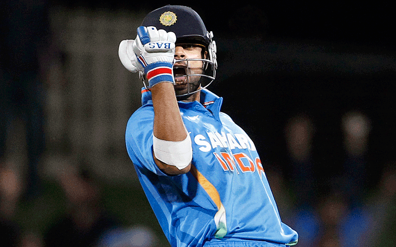 India's Virat Kohli celebrates beating Sri Lanka in their Tri-series one-day international cricket match at Bellerive Oval in Hobart. (REUTERS)