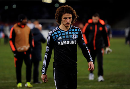 A dejected David Luiz of Chelsea walks off the pitch following his team's 3-1 defeat during the UEFA Champions League round of 16 first leg match against Napoli at Stadio San Paolo on February 21 in Naples, Italy. (FILE)