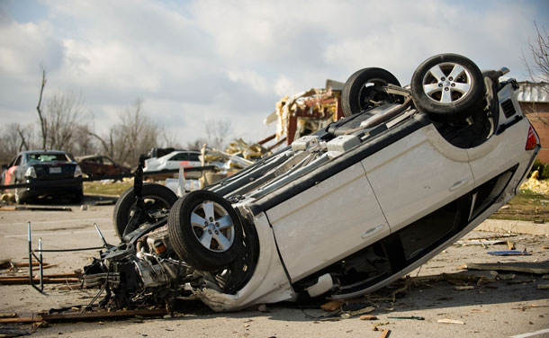 Photo courtesy of the Indiana National Guard shows a vehicle flipped over by a tornado in Henryville, Indiana, March 3, 2012. The Indiana National Guard has activated approximately 250 soldiers to come to the aid of affected communities.(REUTERS)