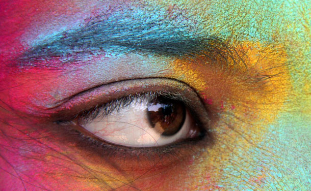 A student, with her face smeared in coloured powder, celebrates Holi, also known as the festival of colours, at a college in the northern Indian city of Chandigarh March 2, 2012. The traditional event heralds the beginning of spring and will be celebrated all over India on March 8. (REUTERS)