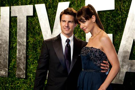 Actor Katie Holmes and Tom Cruise arrive at the Vanity Fair Oscars after-party on Feb 26, 2012. (REUTERS)