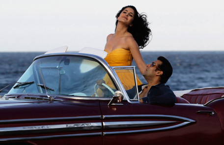 Bollywood star Salman Khan (R) drives with Katrina Kaif in a convertible car on Havana's seafront boulevard El Malecon. The actors are working on scenes for their latest film, "Ek Tha Tiger". The movie, directed by Kabir Khan, is expected to be released in June 2012. (REUTERS)