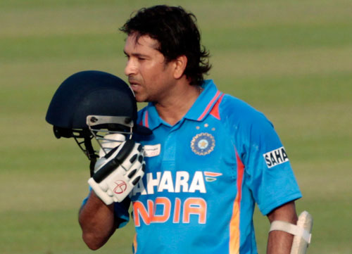 India's Sachin Tendulkar celebrates after he scored his 100th international centuries during their Asia Cup one- day international (ODI) cricket match against Bangladesh in Dhaka March 16, 2012 ( REUTERS)