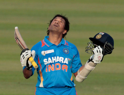 India's Sachin Tendulkar celebrates after he scored his 100th international centuries during their Asia Cup One Day International (ODI) cricket match against Bangladesh in Dhaka March 16, 2012 (REUTERS)