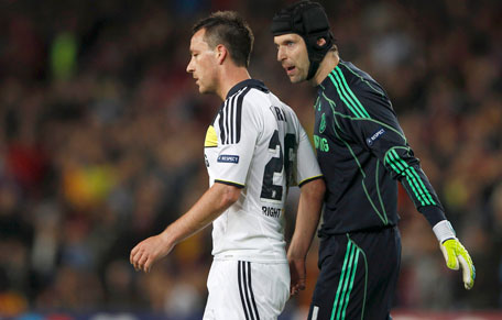 Chelsea's Peter Cech (right) consoles team mate John Terry after he was shown a red card and sent off during their Champions League semi-final second leg against Barcelona at Camp Nou stadium in Barcelona on Tuesday. (REUTERS)
