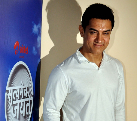 Indian Bollywood actor Aamir Khan poses during a promotional event for the song "Satyamev Jayate Satyamev Jayate" for his reality television show in Mumbai on April 13, 2012. (AFP)