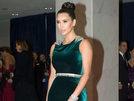 Kim Kardashian walks on the red carpet for  the annual White House Correspondents' Association Dinner at the Washington Hilton in Washington. (REUTERS)