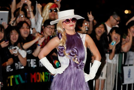 US pop singer Lady Gaga poses in front of her fans at a hotel in Hong Kong. Lady Gaga will hold a concert in Hong Kong as part of her Asia tour. (AP)