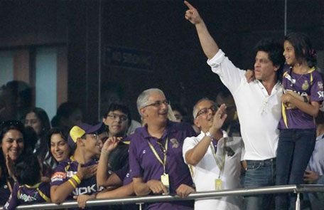 Kolkata Knight Riders' co-owner and Bollywood actor Shah Rukh Khan holds his daughter and celebrates after his team won the match against Pune Warriors' during an Indian Premier League (IPL) cricket match in Kolkata, India. (AP)